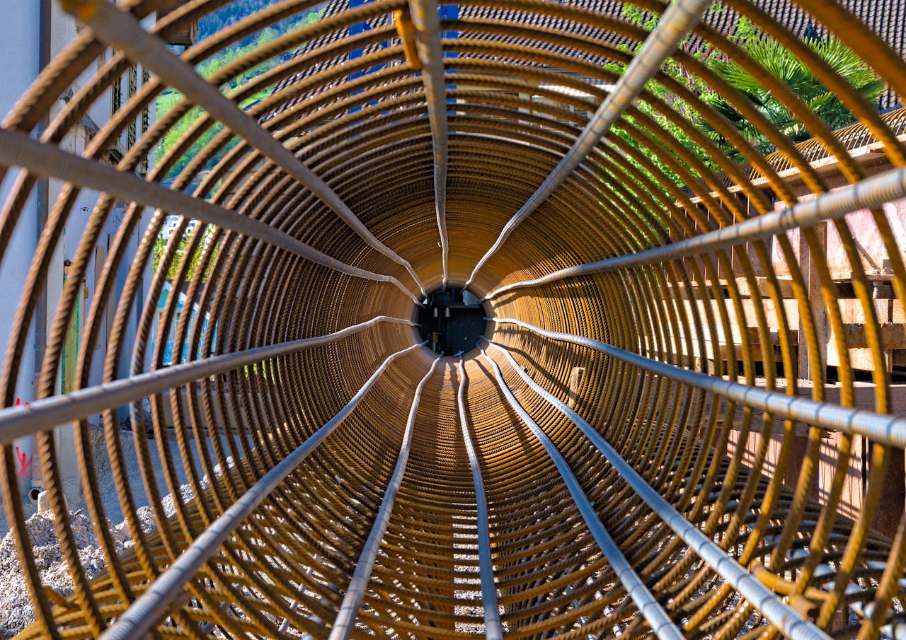 Intriguing perspective of a spiraled industrial pipe structure in Vitznau, Switzerland.
